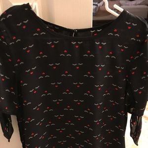 Cute blouse with tie sleeves